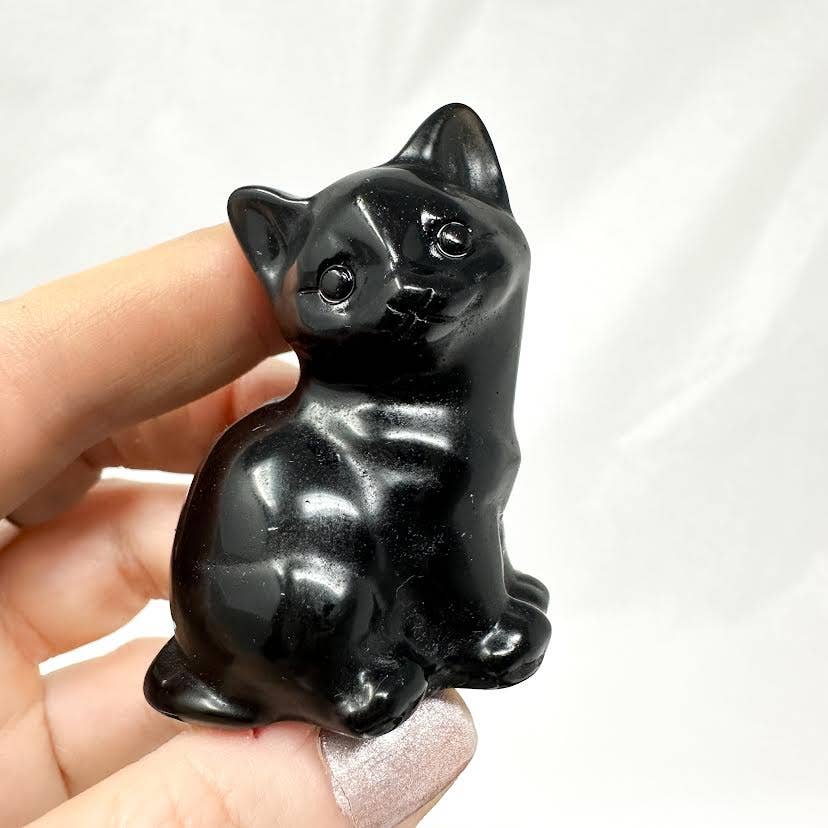 obsidian cat carving
