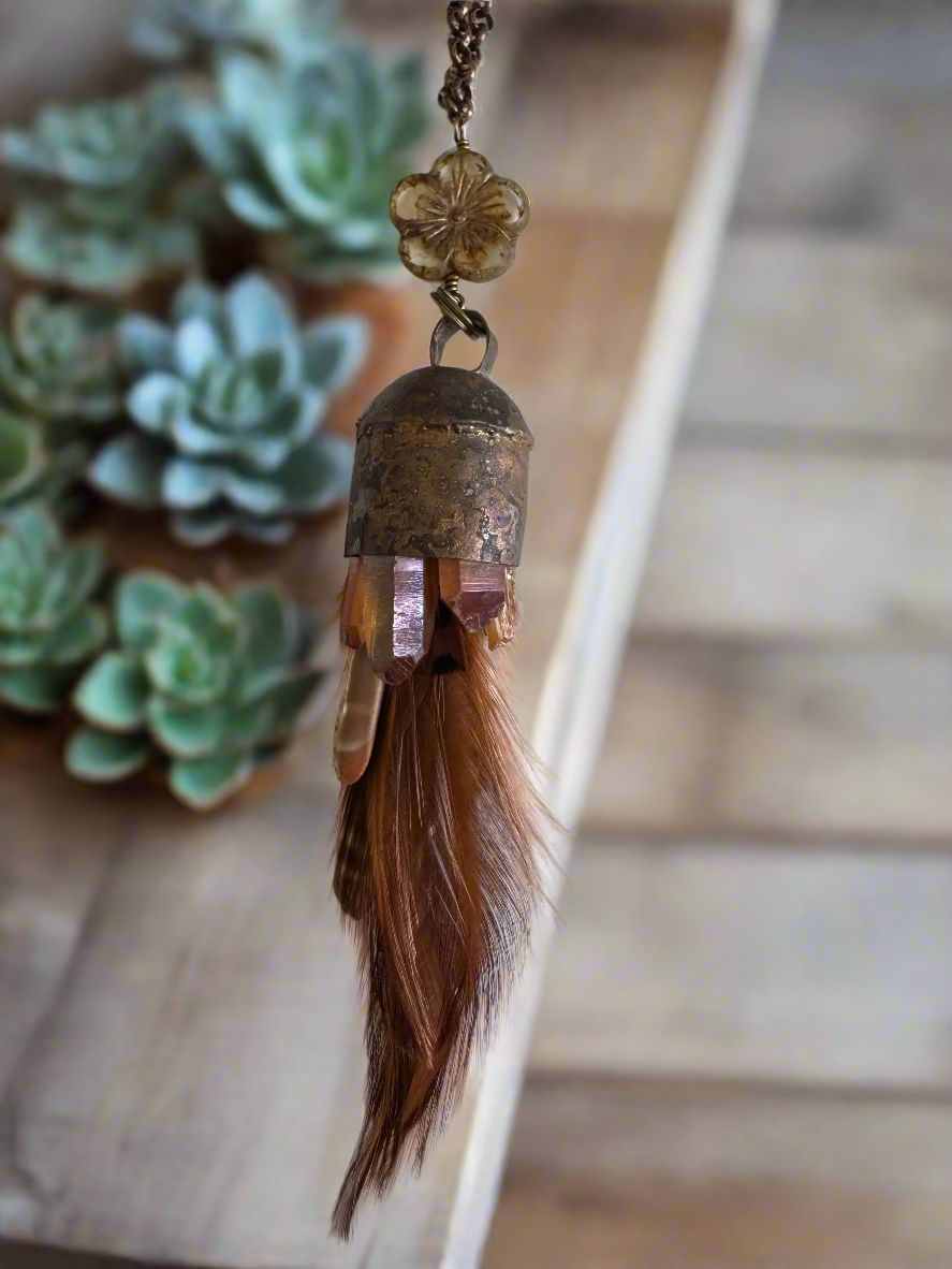 brass bell pendant with aura quartz, urchin spines, feathers on copper chain