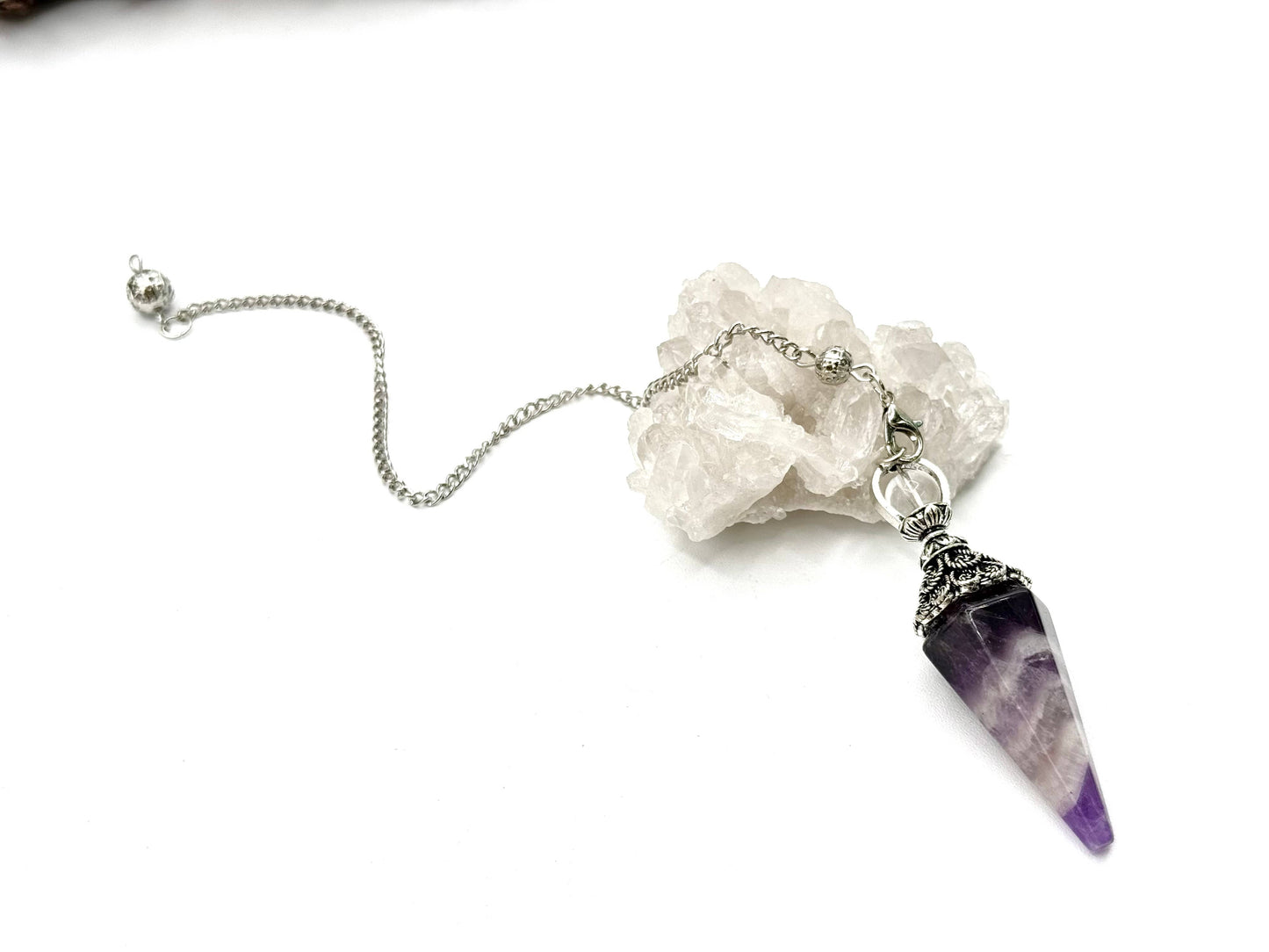pendulum with silver cap and quartz sphere