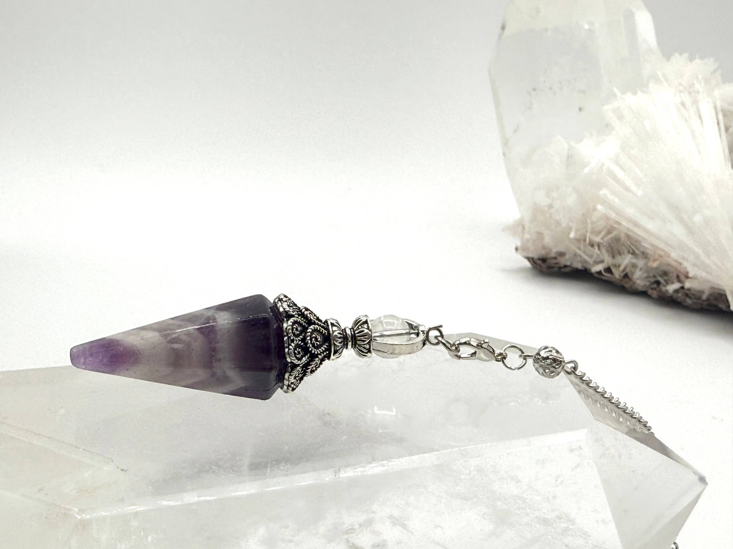 pendulum with silver cap and quartz sphere