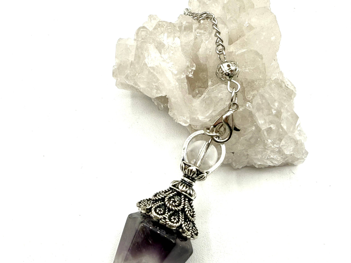 pendulum with silver cap and quartz sphere