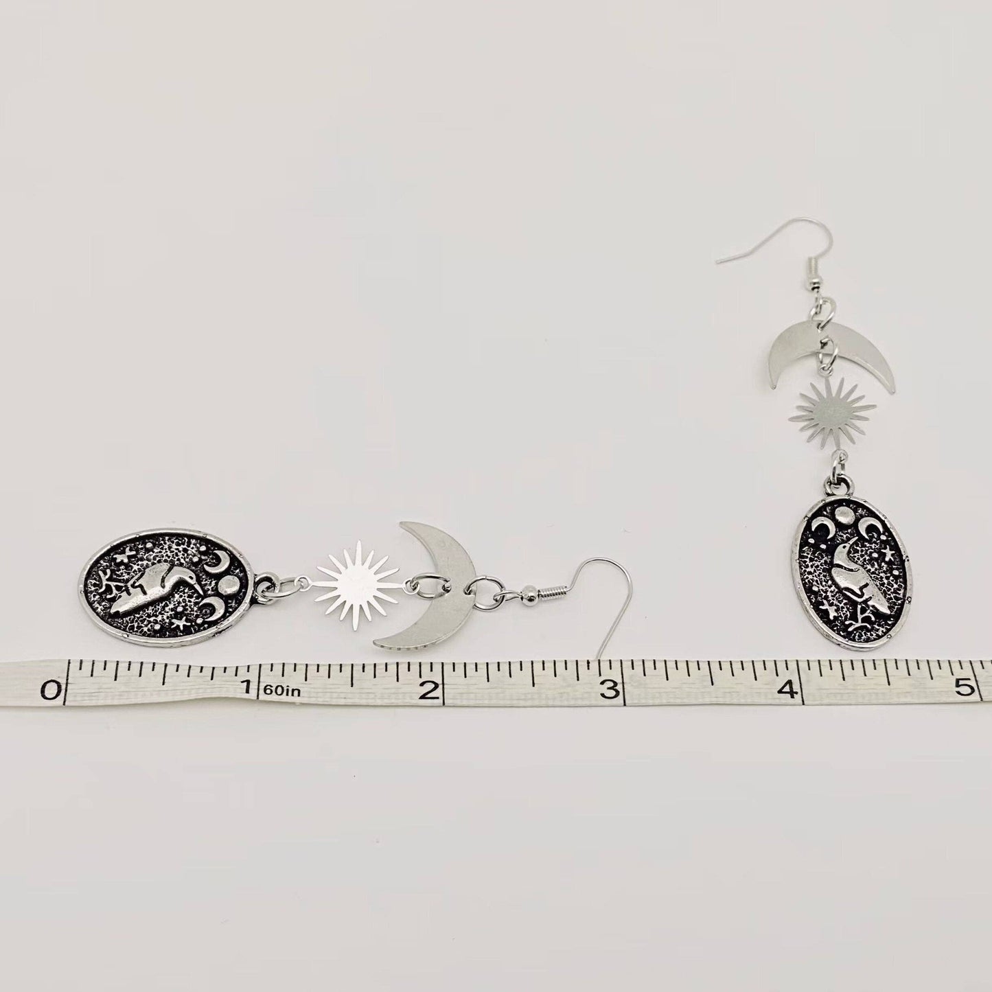 crow moon phases dangly earrings