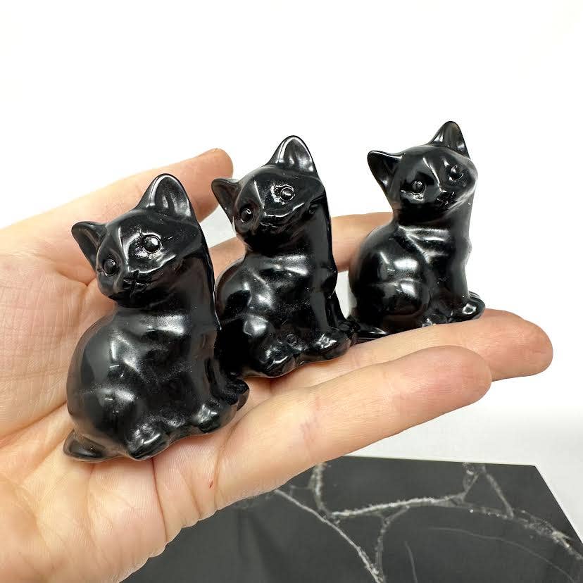 obsidian cat carving