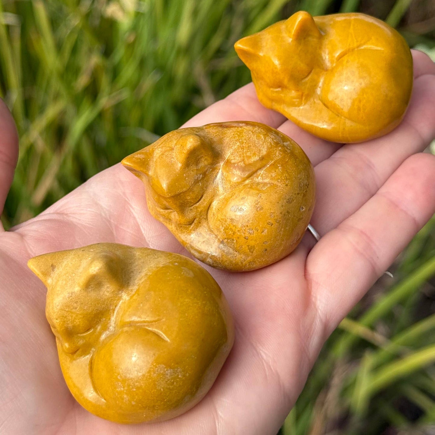 yellow jasper sleeping cat figurine
