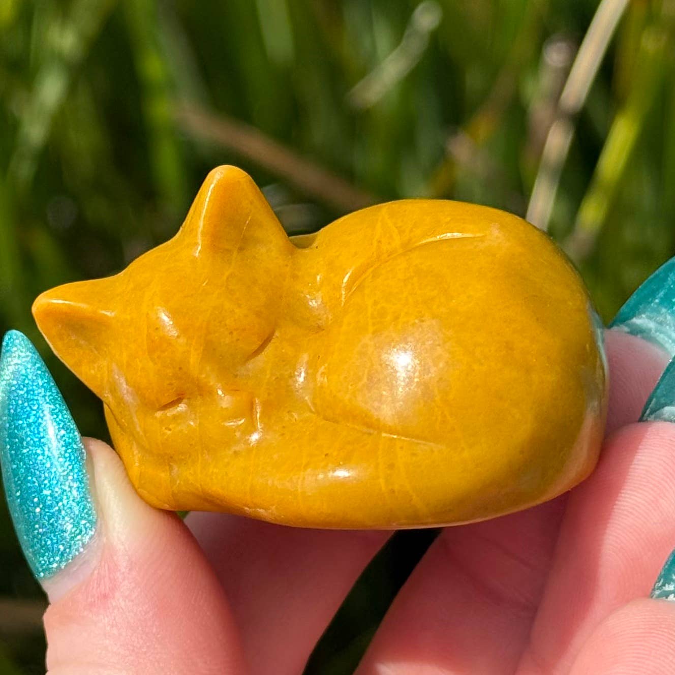 yellow jasper sleeping cat figurine