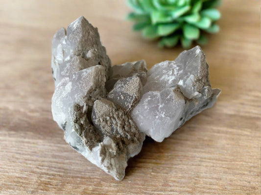 large quartz cluster with calcite, pyrite, and galena inclusions