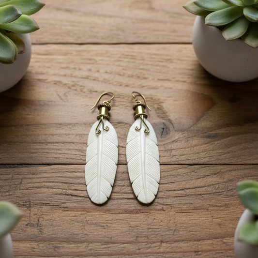 bone feather earrings (responsibly sourced)