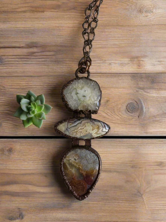 handmade pendant with crazy lace agate and solar quartz slice set in copper