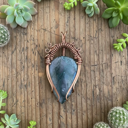 handmade copper-wrapped moss agate pendant