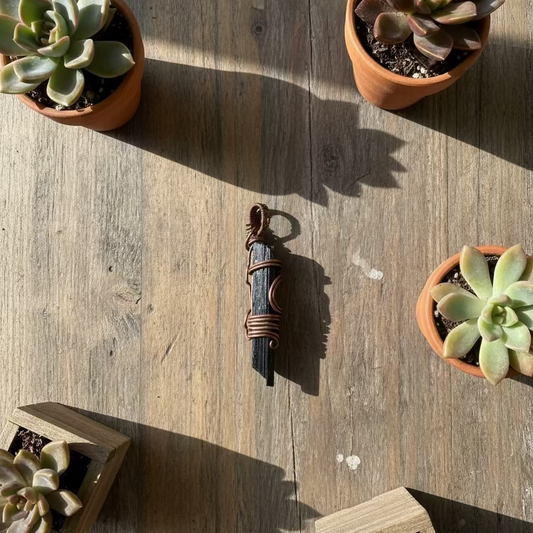 handmade copper-wrapped black tourmaline pendants