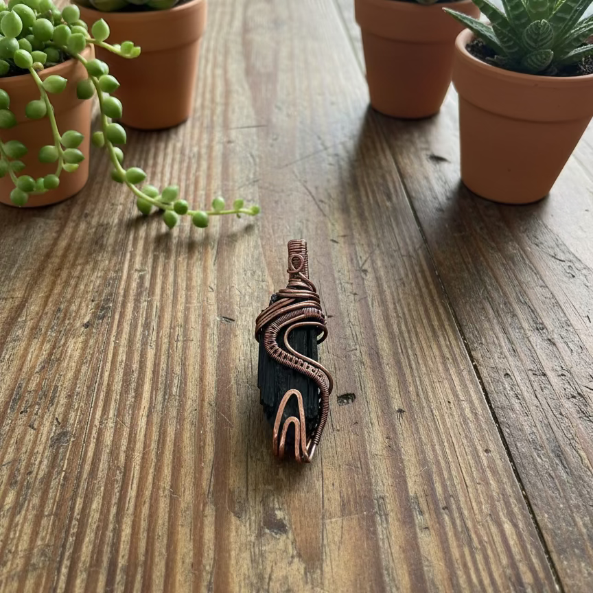 handmade copper-wrapped black tourmaline pendants