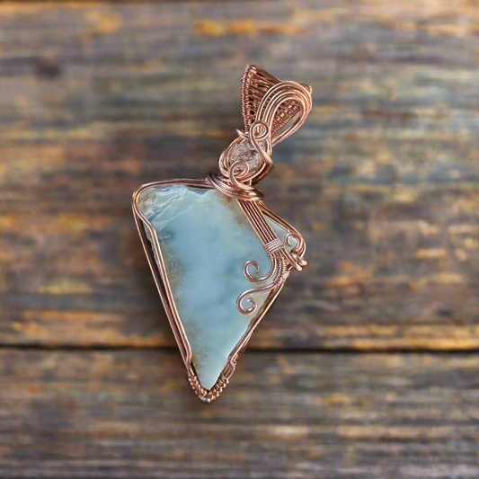 handmade copper wire-wrapped larimar and Herkimer diamond pendant