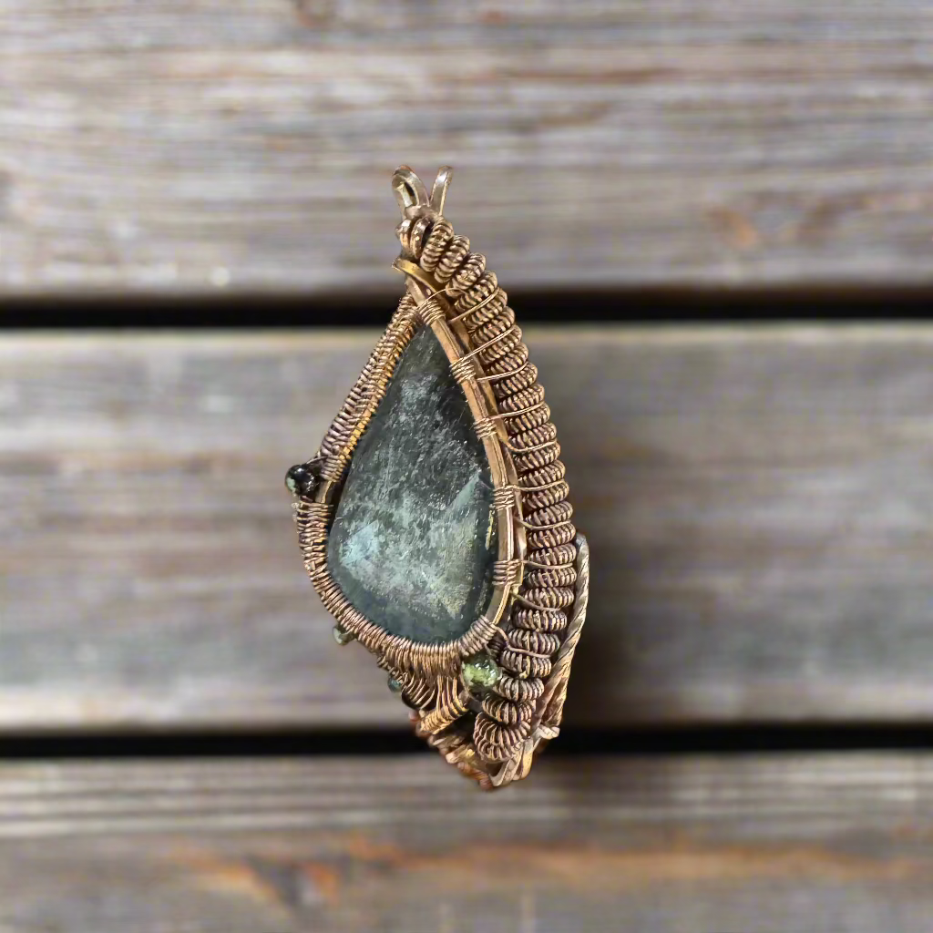 handmade copper-wrapped blue Tara quartz and moldavite pendant