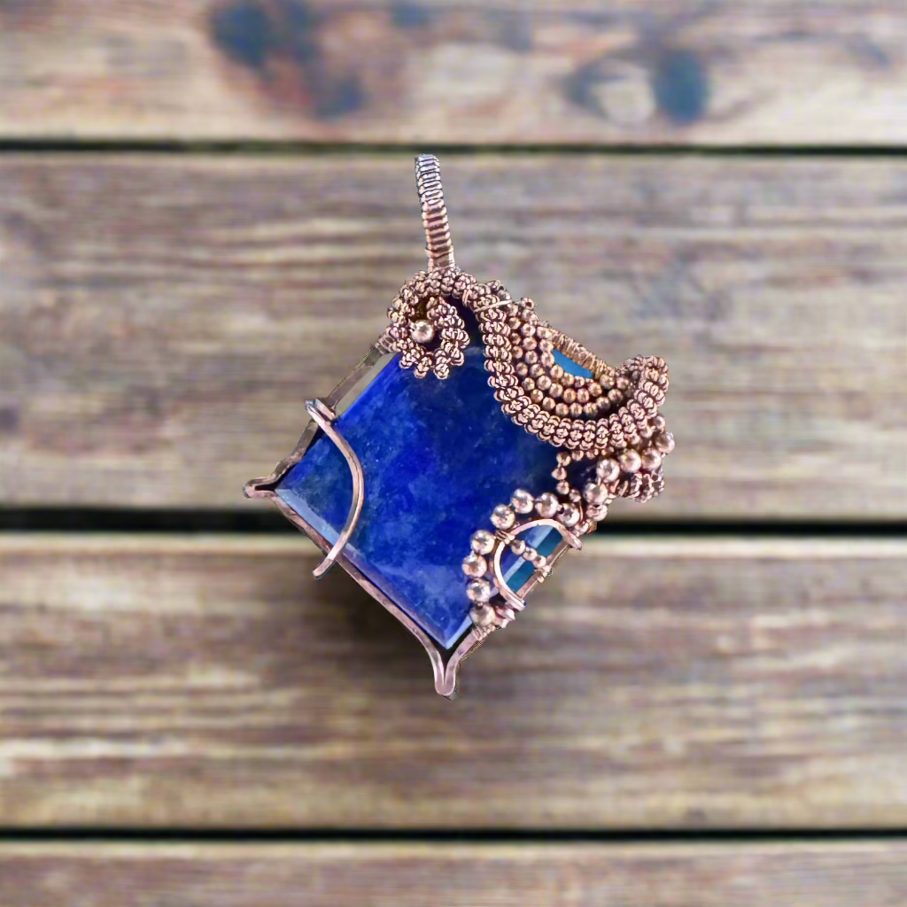 handmade copper-wrapped lapis lazuli pendant