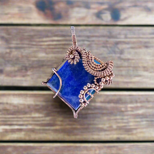 handmade copper-wrapped lapis lazuli pendant