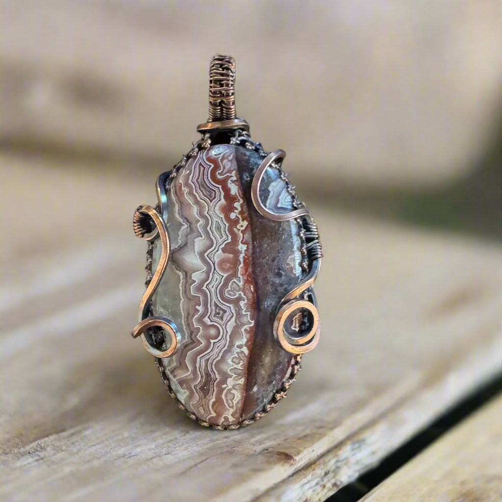 handmade copper-wrapped banded agate pendant