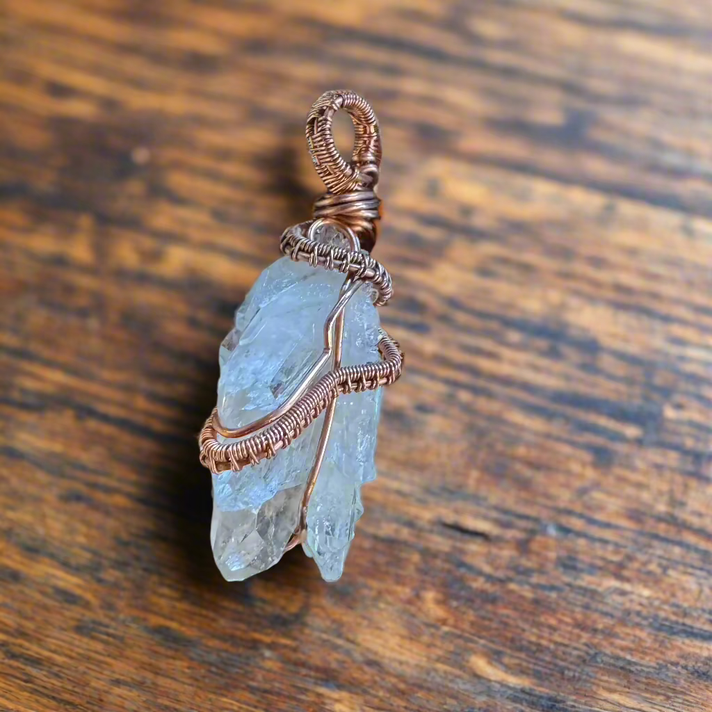 handmade copper-wrapped quartz cluster pendant