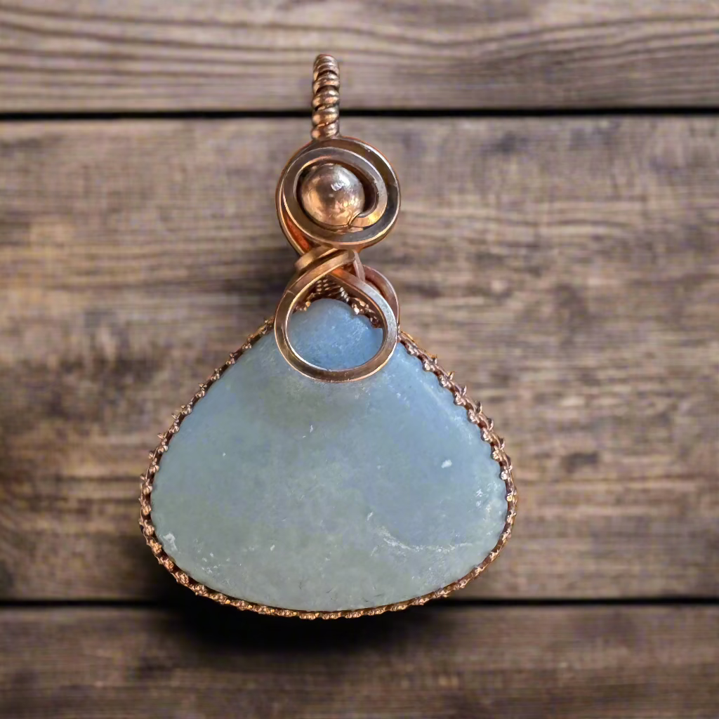 handmade copper-wrapped blue chalcedony pendant