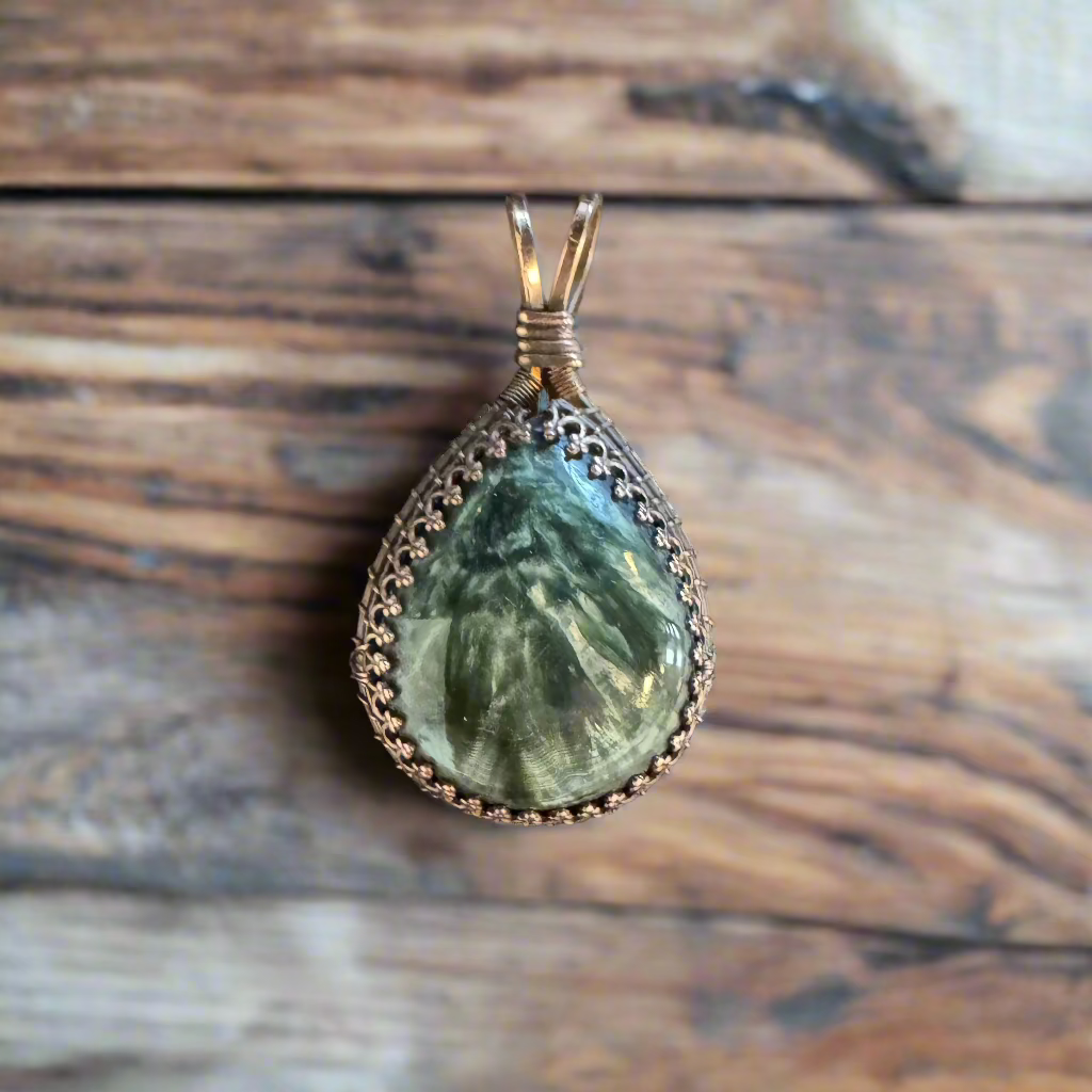 handmade copper-wrapped seraphinite pendant