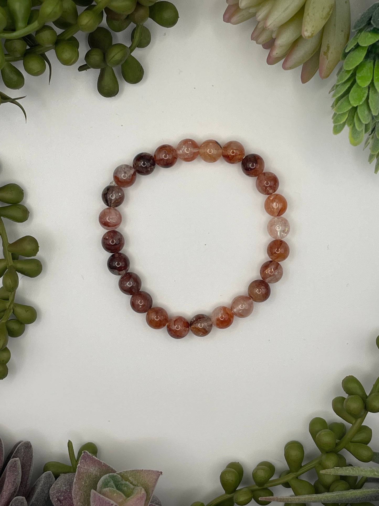 hematoid quartz beaded bracelet (8mm beads)