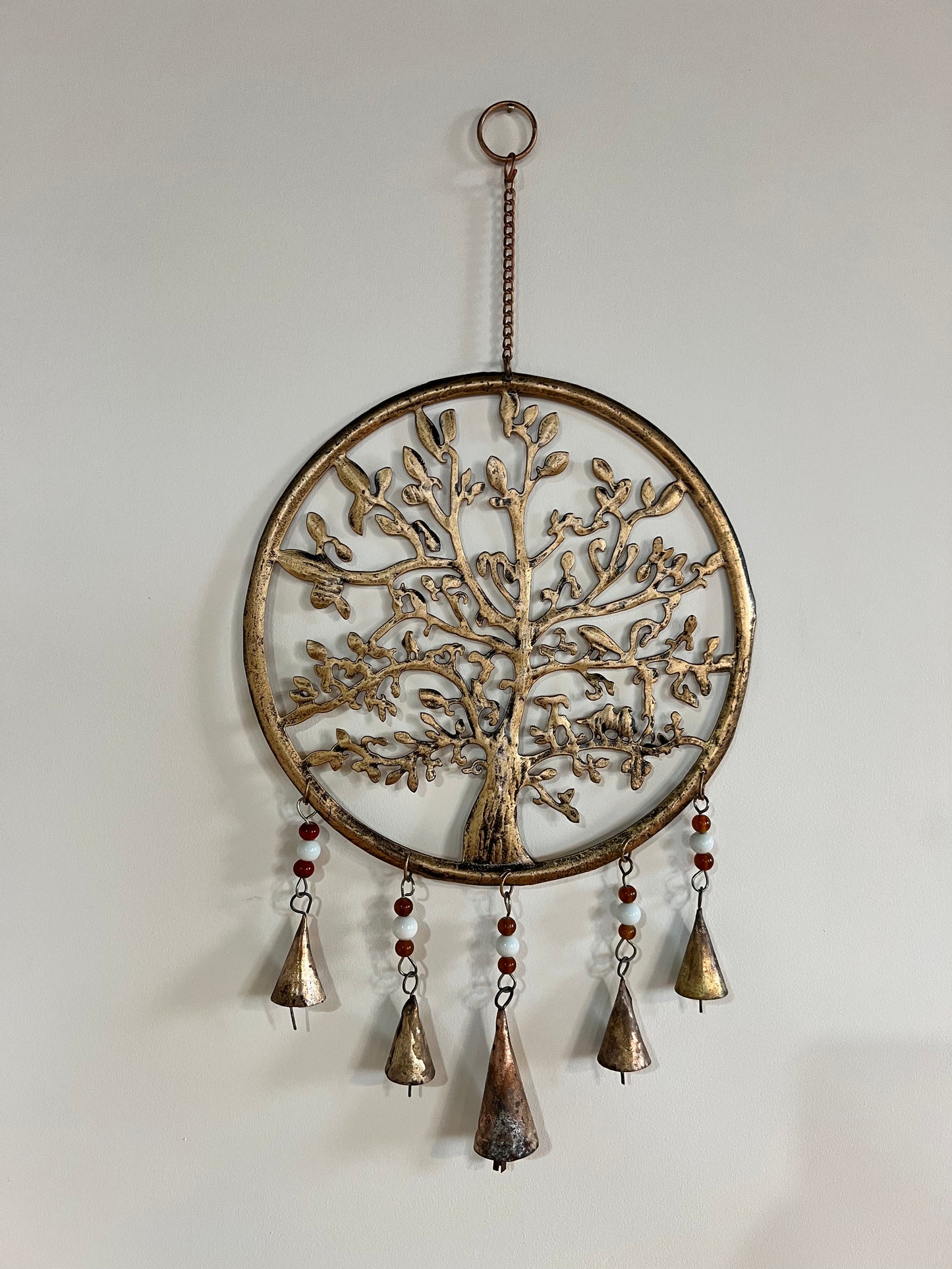 brass hanging decoration with bells