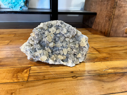 dog-tooth calcite on druzy quartz