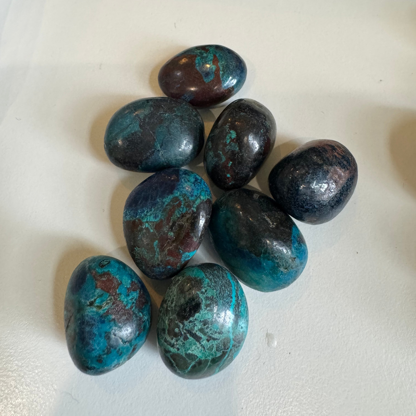 chrysocolla in shattuckite tumbles (with azurite and dioptase inclusions)