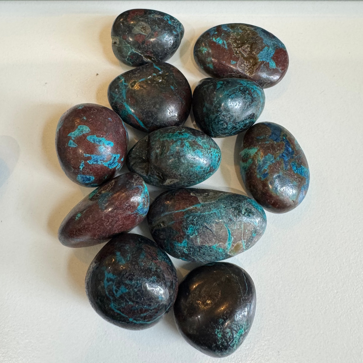 chrysocolla in shattuckite tumbles (with azurite and dioptase inclusions)