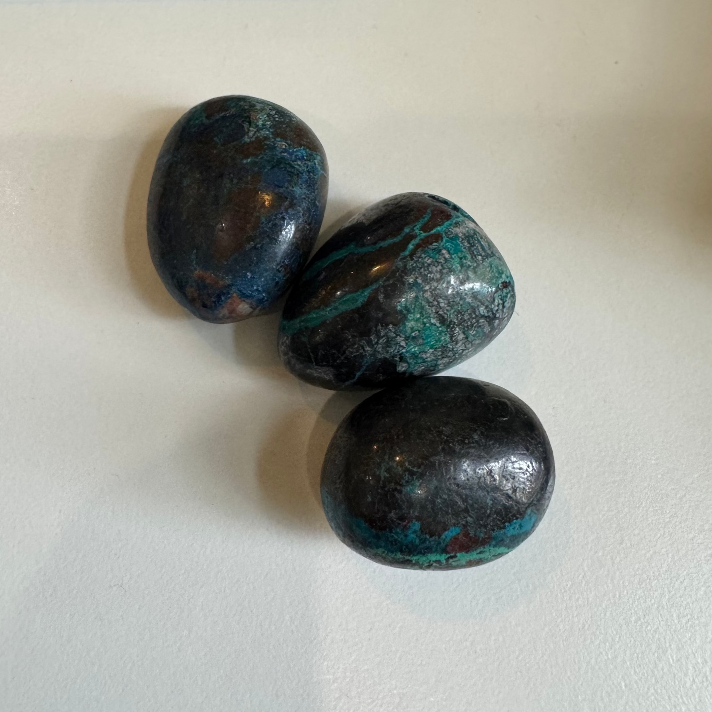 chrysocolla in shattuckite tumbles (with azurite and dioptase inclusions)
