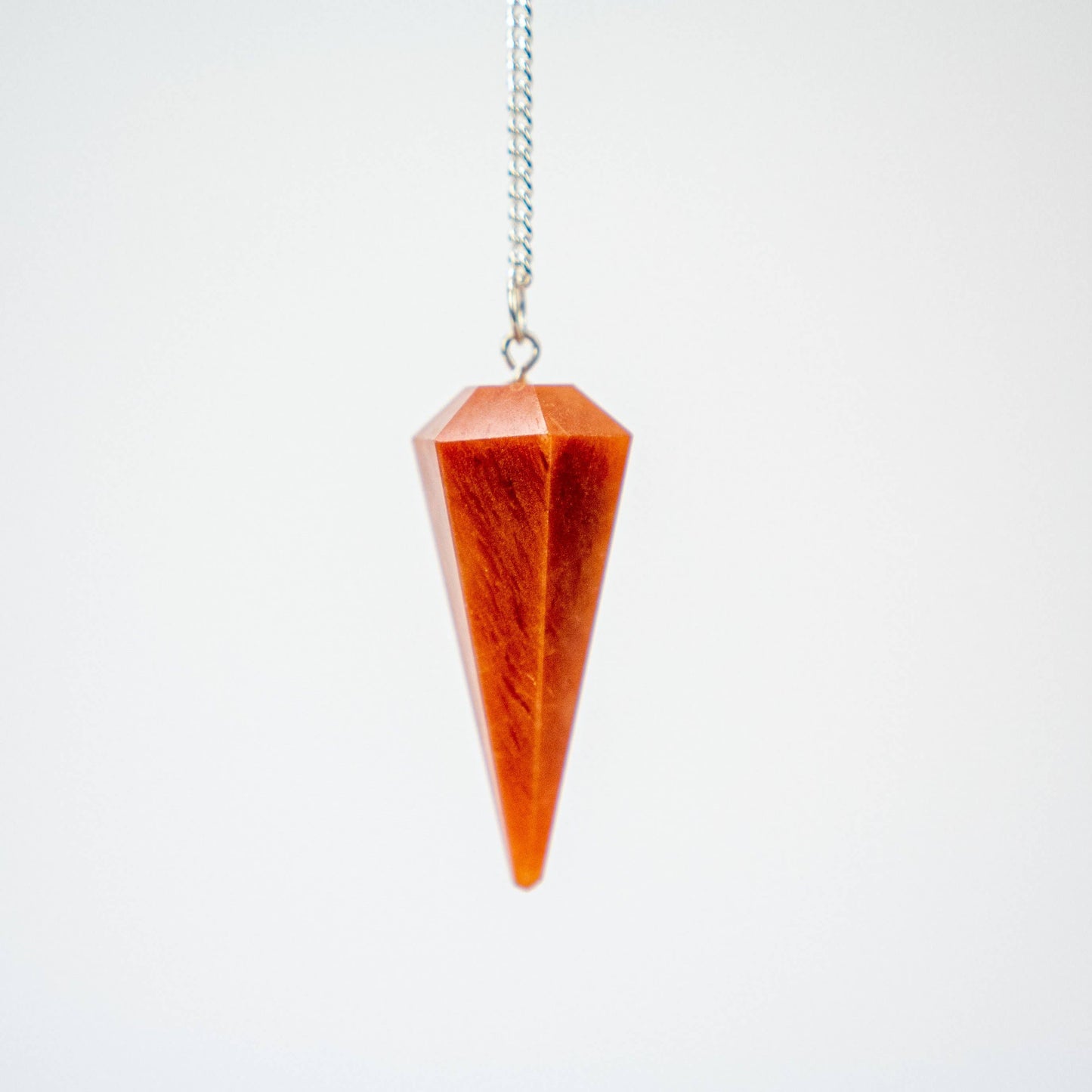 faceted polished pendulum