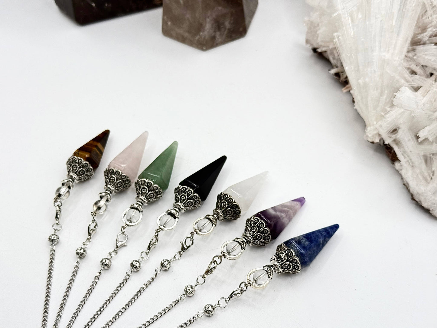 pendulum with silver cap and quartz sphere