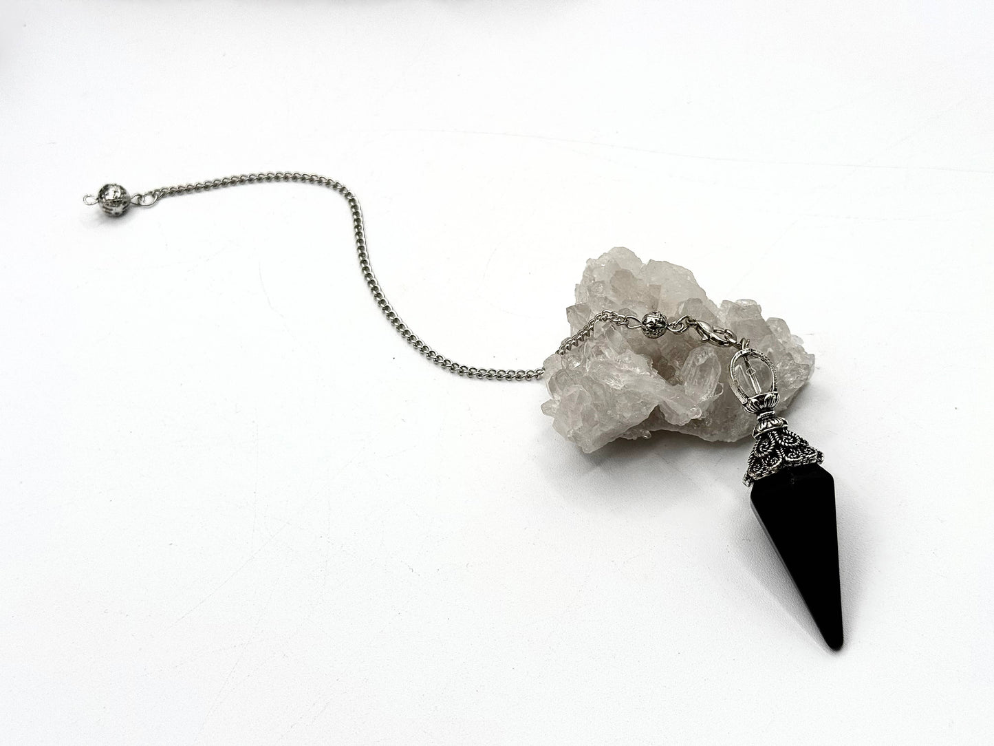 pendulum with silver cap and quartz sphere