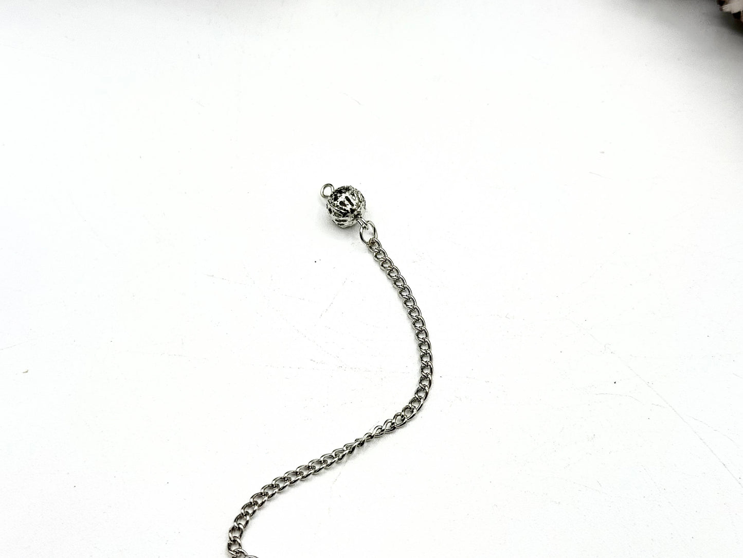 pendulum with silver cap and quartz sphere
