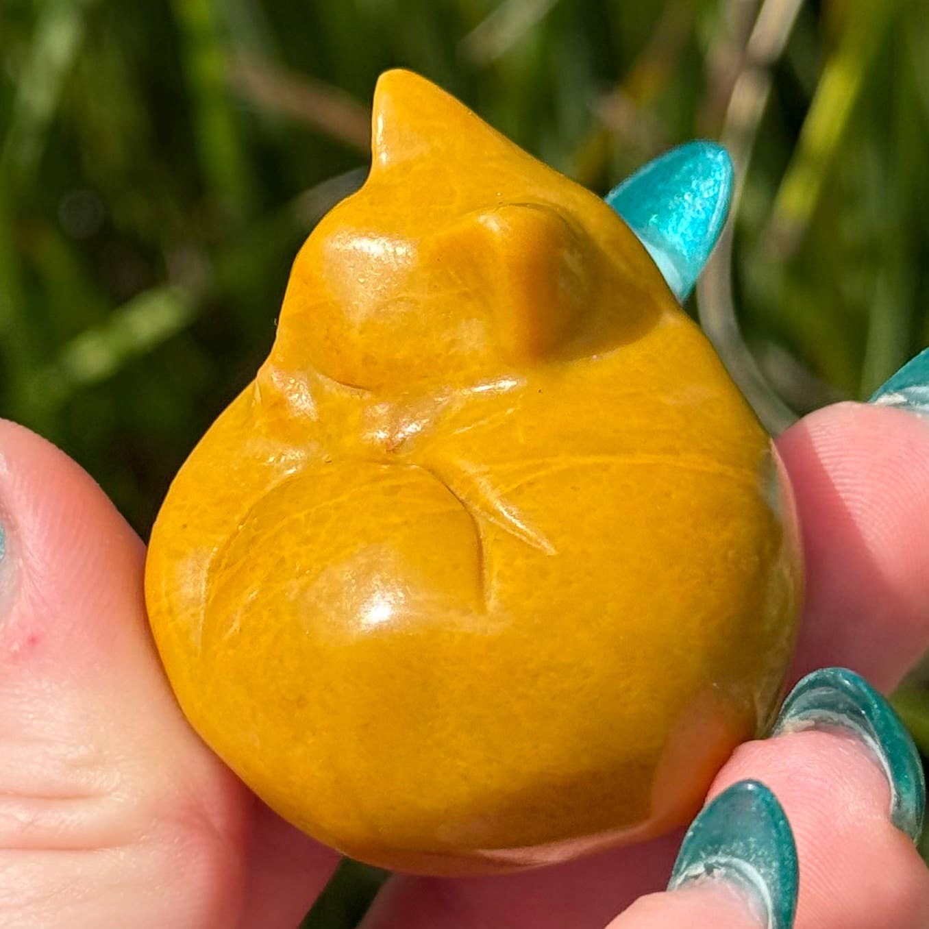 yellow jasper sleeping cat figurine