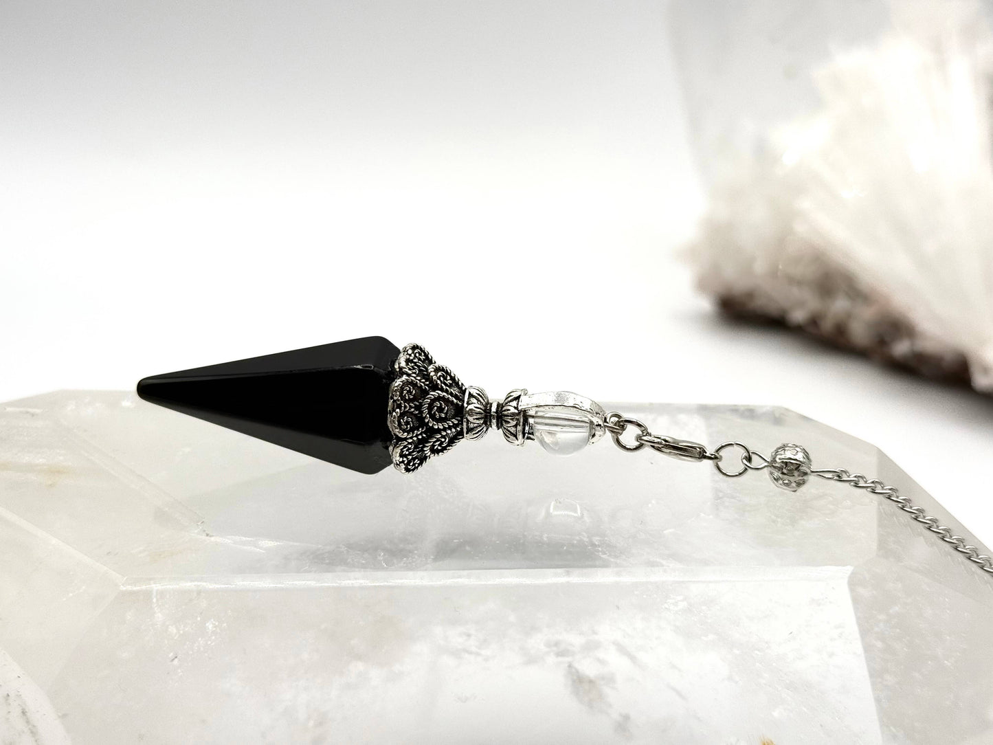 pendulum with silver cap and quartz sphere