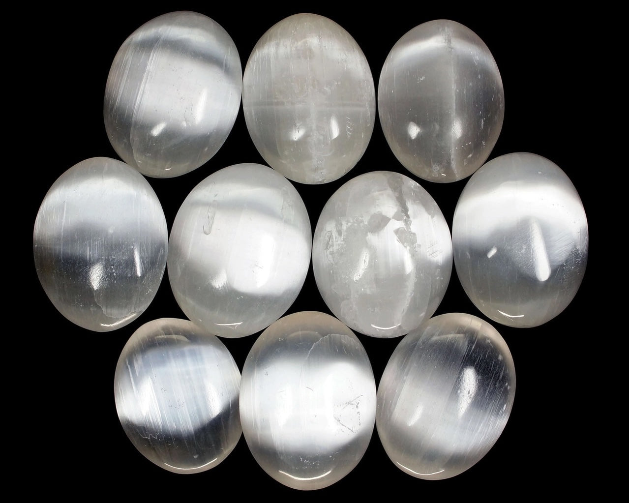 selenite palm stones